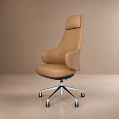 Tan office chair with a tall curved back, padded headrest, wraparound armrests, and a shiny five-spoke base with black casters against a beige background.