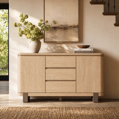 Outer doors flank stacked center drawers, Decorative objects rest on the top surface