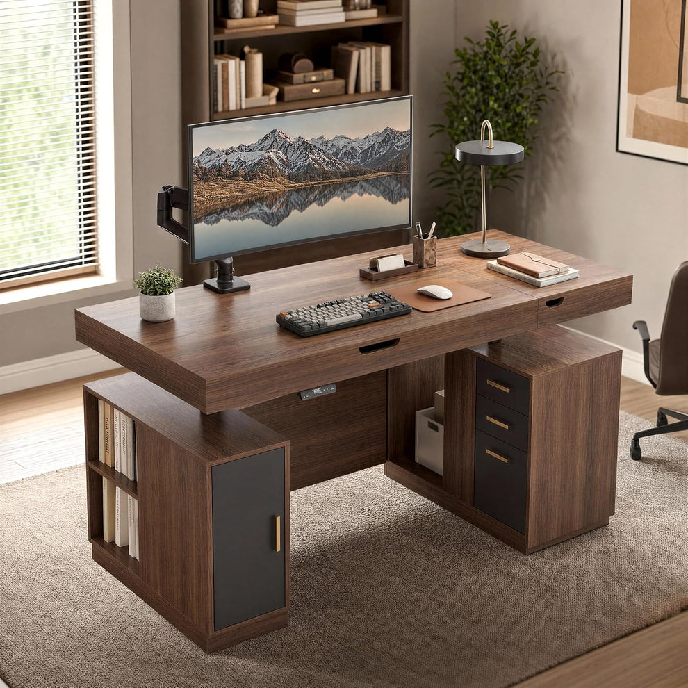 A dark wood desk with drawers, shelves, and a cabinet is set up with a monitor displaying snowy mountains reflected in a lake, a keyboard, mouse, and lamp.