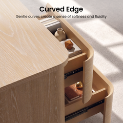 Rounded wood-toned dresser corner and open drawer shown close up