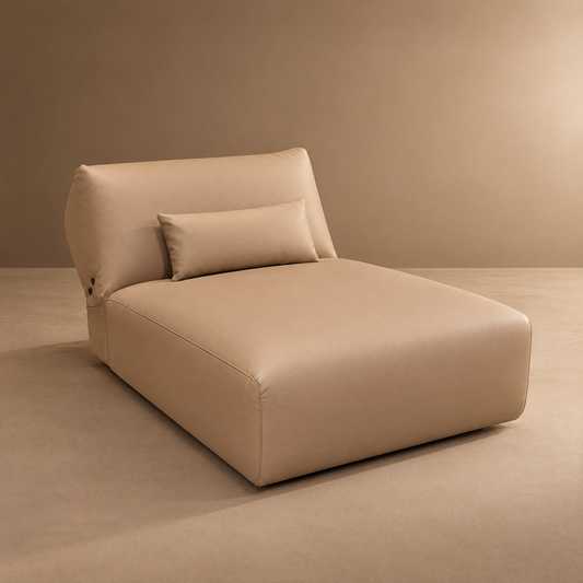 Beige armless chaise lounge with a broad backrest and matching lumbar pillow.