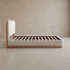 Side view shows a wood-look bed frame with white padded panels and exposed slats