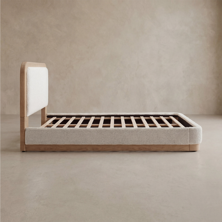 Side view shows a wood-look bed frame with white padded panels and exposed slats