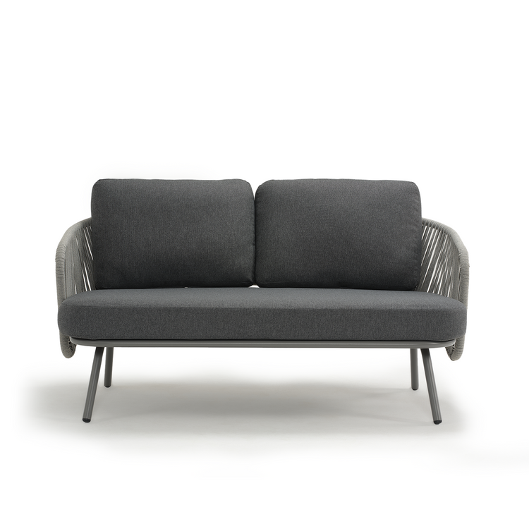 Dark two-seat sofa has two back cushions and open woven side panels