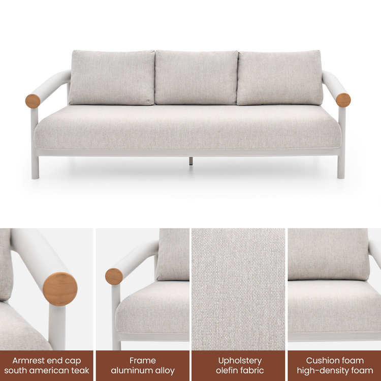A three-seat sofa has a pale tubular frame, three back cushions, wood-toned arm caps, and four detail panels