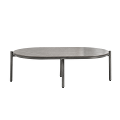 The low oval tabletop is supported by a slim dark frame and legs
