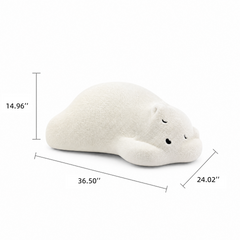 White seal-shaped plush cushion on a plain background with measurement arrows