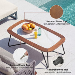 Outdoor table has a white veined center, brown rounded border, and black tubular sled legs
