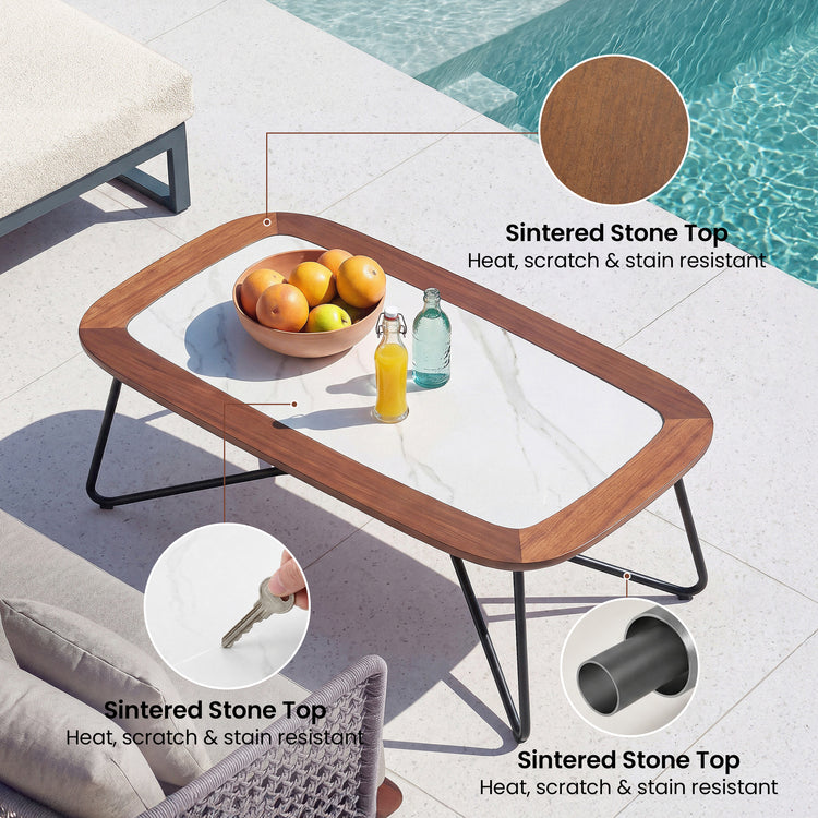 Outdoor table has a white veined center, brown rounded border, and black tubular sled legs