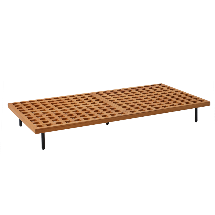Rectangular outdoor coffee table with a wood-tone lattice top and short black legs, shown at an angle