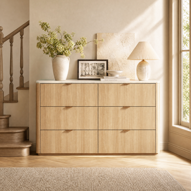 Six-drawer cabinet styled with a lamp, vase, picture, and bowl, Two drawer columns fill the front