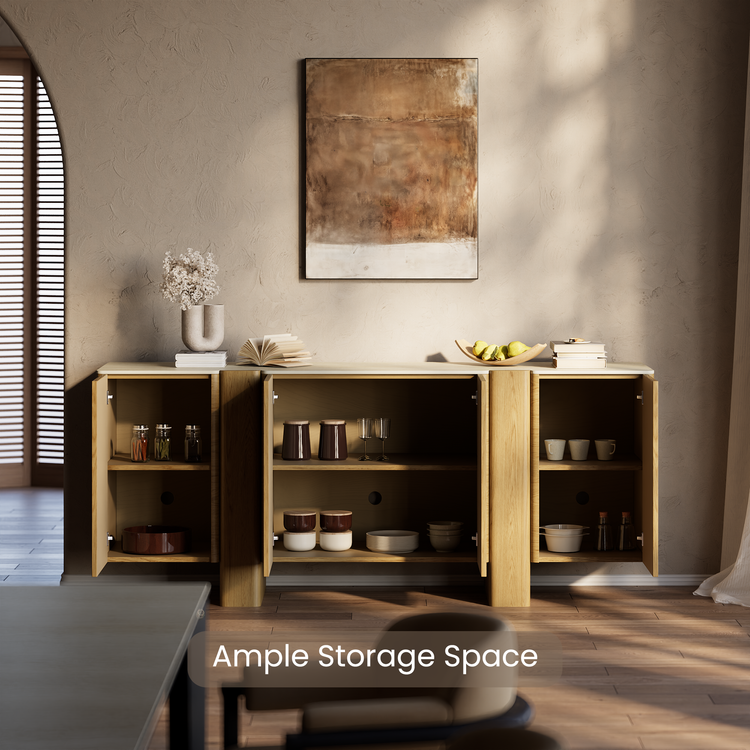 Wood sideboard with open cabinets displaying dishes and glassware.