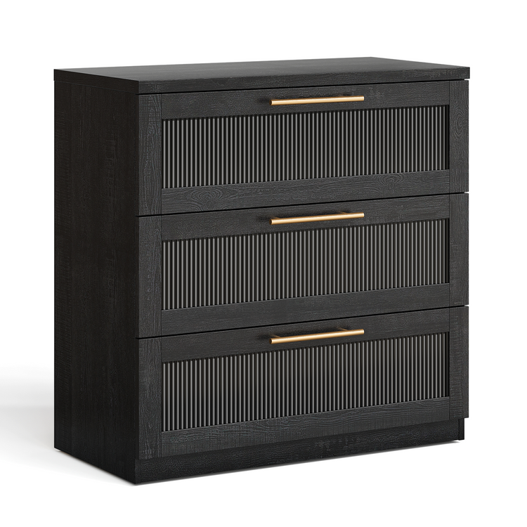 Black three-drawer dresser with ribbed inset fronts and gold-tone bar handles on a white background