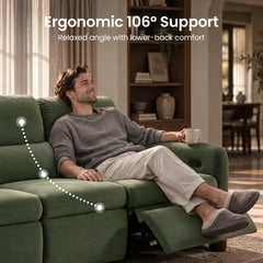 Man relaxing with a mug on a green reclining sofa.