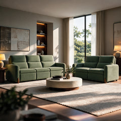 Green upholstered sofa and loveseat in a sunlit modern living room.
