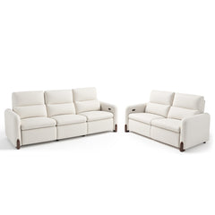 Cream three-seat and two-seat sofas with padded backs and broad armrests.