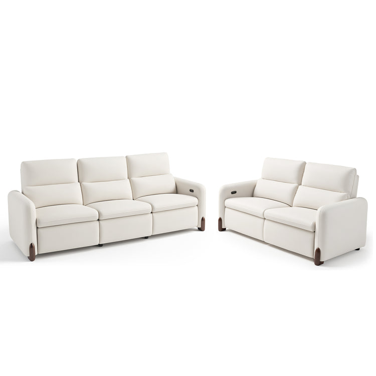 Cream three-seat and two-seat sofas with padded backs and broad armrests.